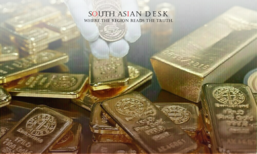 A stack of shiny gold bullion bars and coins, symbolizing wealth and investment.