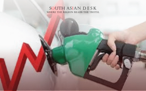 A green fuel pump nozzle being inserted into a car's fuel tank, with a red upward-trending arrow overlaid to symbolize rising fuel prices.