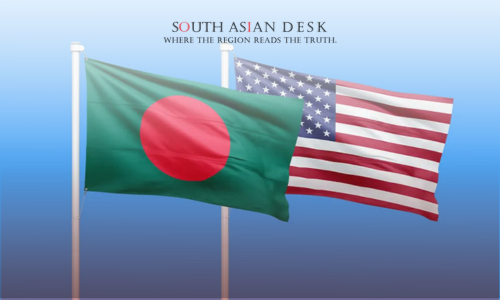The flags of Bangladesh and the United States waving on poles against a clear blue sky.