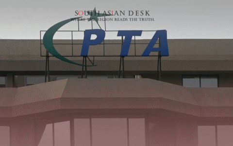 A building with a sign displaying "PTA" and a crescent moon and star logo on the roof.