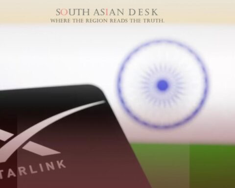 A Starlink device logo in the foreground with the Indian national flag featuring saffron, white, and green colors with a blue Ashoka Chakra in the background.