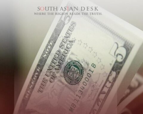 A close-up image of a U.S. dollar bill, showcasing green currency with detailed designs and text.