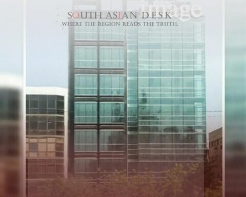 A modern skyscraper with a glass facade, featuring a sign with a logo that says 'image’, set in a downtown urban environment.