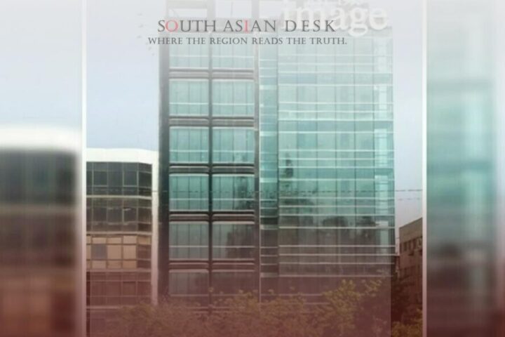 A modern skyscraper with a glass facade, featuring a sign with a logo that says 'image’, set in a downtown urban environment.