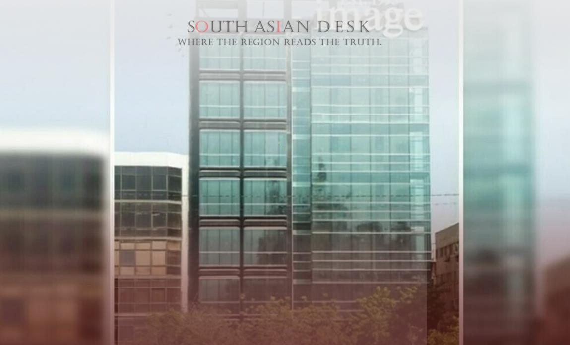 A modern skyscraper with a glass facade, featuring a sign with a logo that says 'image’, set in a downtown urban environment.