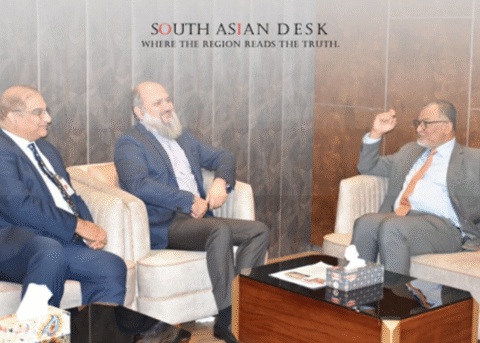 Bangladesh and Pakistan officials shake hands at a diplomatic meeting in Dhaka, August 2025.