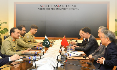 China Foreign Minister Wang Yi and Field Marshal Asim Munir discuss security in Islamabad on August 21, 2025.