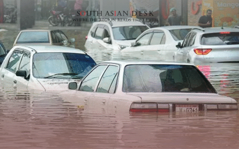 Various Cars Half-Submerged in Floodwater on the Roads of Karachi
