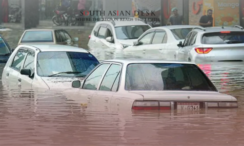 Various Cars Half-Submerged in Floodwater on the Roads of Karachi