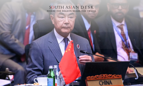 Chinese Minister Sitting on a Chair in Front of the Mic, surrounded by several people