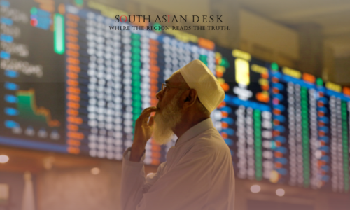 An older man wearing a white cap is watching stock rates at PSX