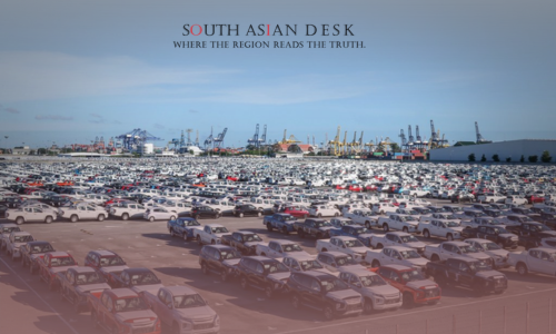 Pakistan Automotive Industry's Next Jump 1 An aerial view of various cars parked in an open ground, showing the Pakistan automotive industry's strengths