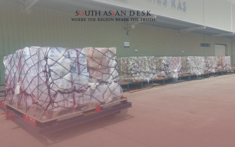 Several pallets of packaged goods wrapped in plastic are relief shipment to Gaza.