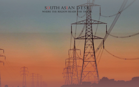A row of silhouetted electricity transmission towers depicting Electricity price decrease due to less power loss