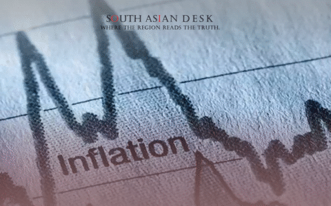 A close-up of a graph with the word "Inflation" printed on it, showing fluctuating trends over time.