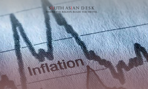 A close-up of a graph with the word "Inflation" printed on it, showing fluctuating trends over time.