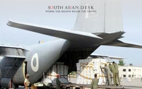 a group of PAF men loading a plane