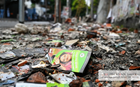A hasina's poster on the ground depicting core reason of bangladesh financial crisis
