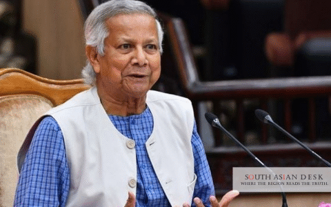 Muhammad Yunus sitting in a meeting for Beijing Dhaka Alliance
