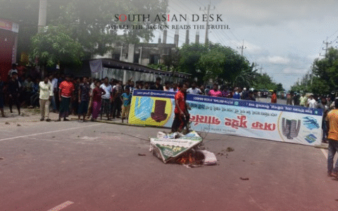 Workers protest at Uttara in Nilphamari, Bangladesh, during a EPZ clash with police on September 2, 2025.