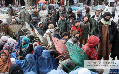 A long rows of people waiting can be seen in the picture, which depicts unemployment crisis in Afghanistan