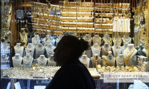 India Gold Prices Pullback Hits 2.6 on-] Dollar Strength